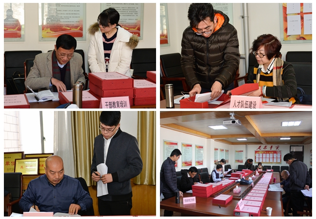 评估组查阅资料.jpg 评估组查阅资料.jpg